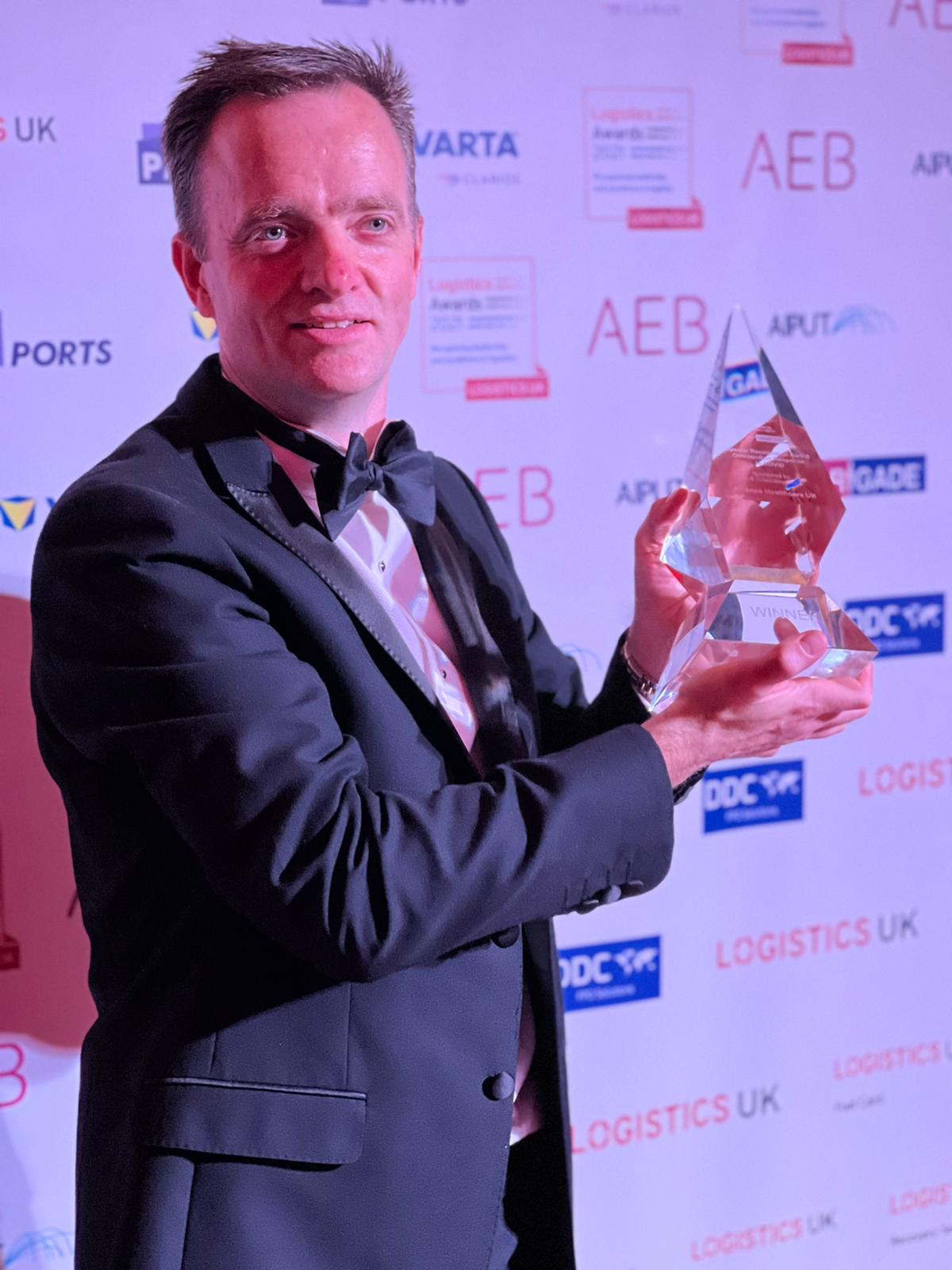 Matt Addison, Operations Director, Alliance Healthcare UK with the award